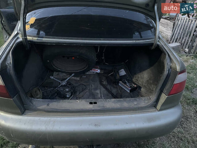 Бежевий Деу Ланос, об'ємом двигуна 1.6 л та пробігом 400 тис. км за 2150 $, фото 6 на Automoto.ua