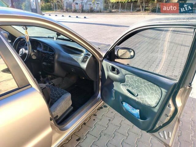 Бежевый Дэу Ланос, объемом двигателя 1.5 л и пробегом 353 тыс. км за 1700 $, фото 8 на Automoto.ua