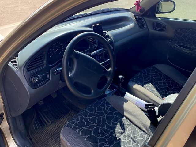 Бежевий Деу Ланос, об'ємом двигуна 1.6 л та пробігом 130 тис. км за 3300 $, фото 6 на Automoto.ua