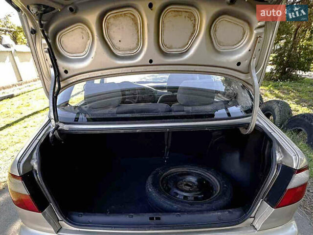 Бежевий Деу Ланос, об'ємом двигуна 1.5 л та пробігом 224 тис. км за 1650 $, фото 10 на Automoto.ua