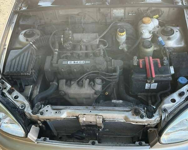 Бежевый Дэу Ланос, объемом двигателя 1.5 л и пробегом 364 тыс. км за 2300 $, фото 4 на Automoto.ua