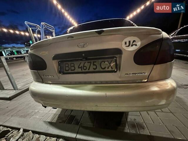 Бежевий Деу Ланос, об'ємом двигуна 1.6 л та пробігом 337 тис. км за 3200 $, фото 4 на Automoto.ua