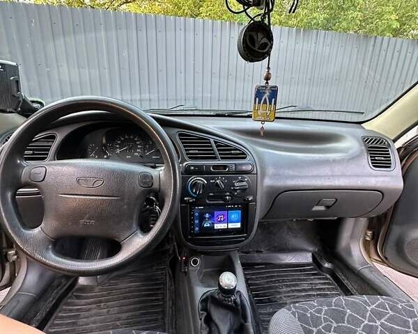 Бежевий Деу Ланос, об'ємом двигуна 1.6 л та пробігом 337 тис. км за 3200 $, фото 14 на Automoto.ua