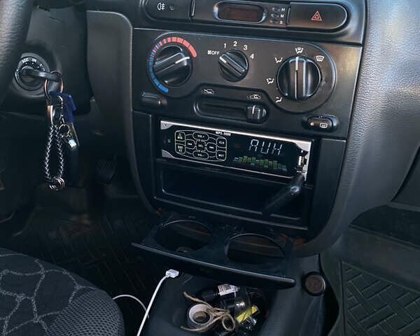 Бежевый Дэу Ланос, объемом двигателя 1.5 л и пробегом 265 тыс. км за 2200 $, фото 6 на Automoto.ua