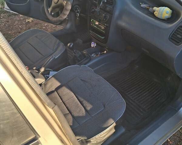 Бежевый Дэу Ланос, объемом двигателя 1.3 л и пробегом 170 тыс. км за 2200 $, фото 1 на Automoto.ua