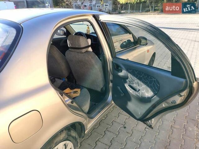 Бежевый Дэу Ланос, объемом двигателя 1.5 л и пробегом 353 тыс. км за 1700 $, фото 9 на Automoto.ua