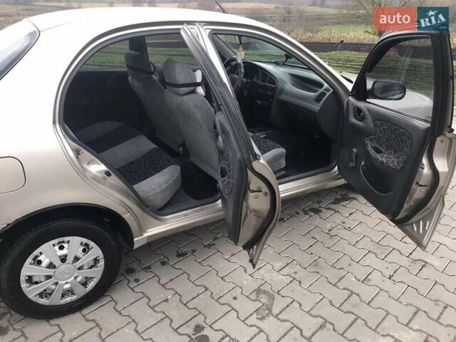 Бежевий Деу Ланос, об'ємом двигуна 1.5 л та пробігом 345 тис. км за 1800 $, фото 8 на Automoto.ua
