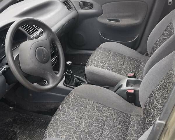 Бежевий Деу Ланос, об'ємом двигуна 1.5 л та пробігом 348 тис. км за 1450 $, фото 7 на Automoto.ua