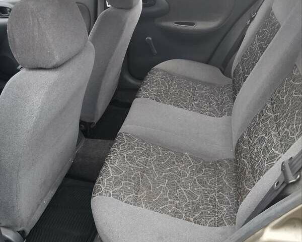 Бежевий Деу Ланос, об'ємом двигуна 1.5 л та пробігом 348 тис. км за 1450 $, фото 11 на Automoto.ua