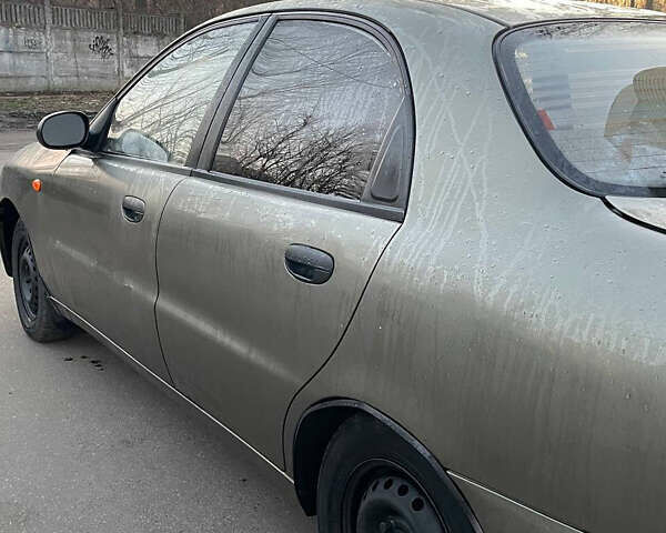 Бежевый Дэу Ланос, объемом двигателя 1.3 л и пробегом 150 тыс. км за 900 $, фото 2 на Automoto.ua