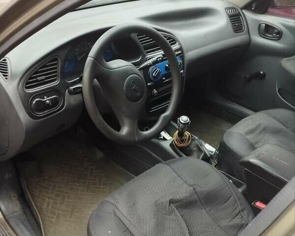 Бежевий Деу Ланос, об'ємом двигуна 1.5 л та пробігом 230 тис. км за 1700 $, фото 5 на Automoto.ua