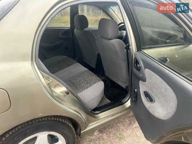 Бежевый Дэу Ланос, объемом двигателя 1.5 л и пробегом 265 тыс. км за 1999 $, фото 8 на Automoto.ua