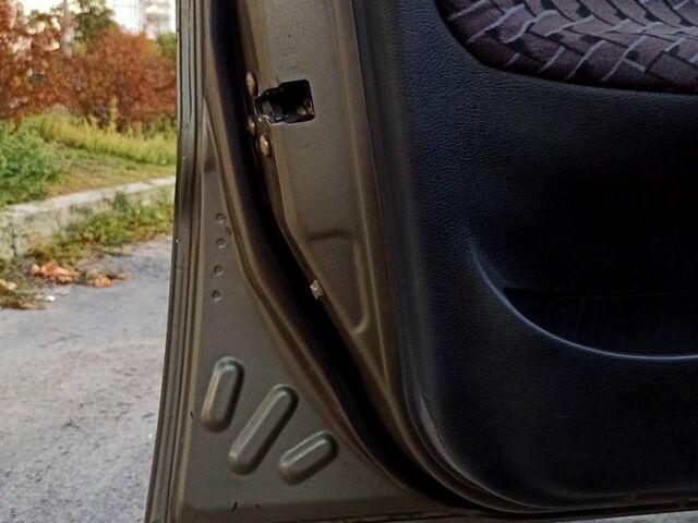 Бежевый Дэу Ланос, объемом двигателя 1.3 л и пробегом 210 тыс. км за 1950 $, фото 11 на Automoto.ua