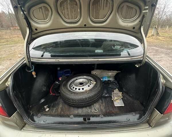 Бежевый Дэу Ланос, объемом двигателя 1.5 л и пробегом 265 тыс. км за 1999 $, фото 6 на Automoto.ua