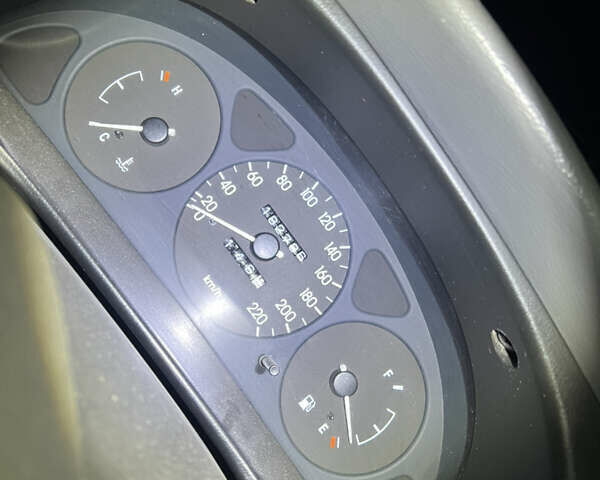 Бежевий Деу Ланос, об'ємом двигуна 1.5 л та пробігом 182 тис. км за 1200 $, фото 14 на Automoto.ua