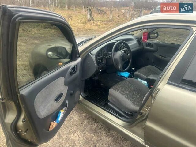 Бежевый Дэу Ланос, объемом двигателя 1.5 л и пробегом 265 тыс. км за 1999 $, фото 16 на Automoto.ua