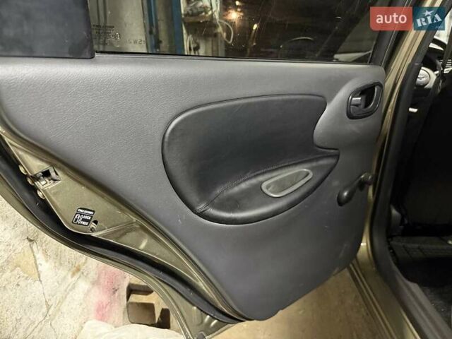 Бежевый Дэу Ланос, объемом двигателя 1.5 л и пробегом 305 тыс. км за 3200 $, фото 11 на Automoto.ua