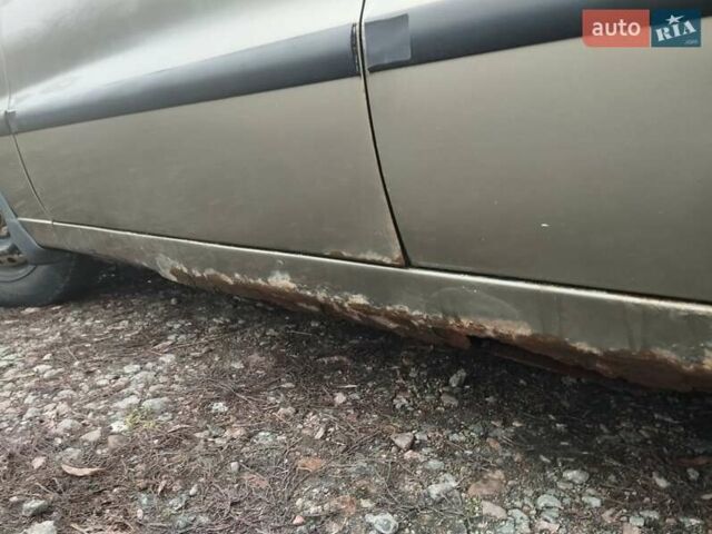 Бежевий Деу Ланос, об'ємом двигуна 1.5 л та пробігом 348 тис. км за 1450 $, фото 24 на Automoto.ua