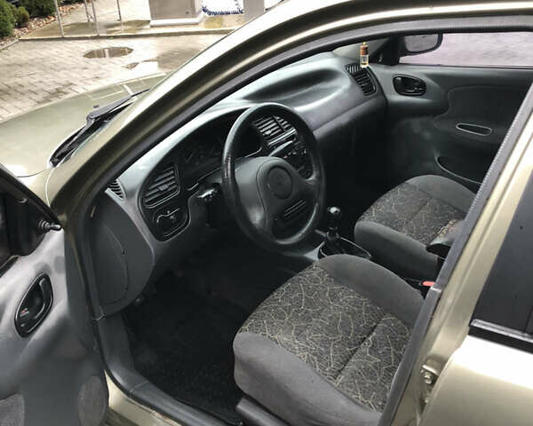 Бежевий Деу Ланос, об'ємом двигуна 1.5 л та пробігом 186 тис. км за 2000 $, фото 17 на Automoto.ua