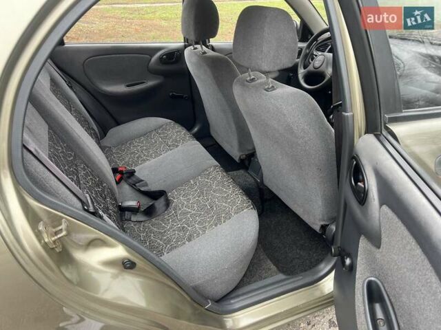 Бежевий Деу Ланос, об'ємом двигуна 1.35 л та пробігом 136 тис. км за 2650 $, фото 10 на Automoto.ua