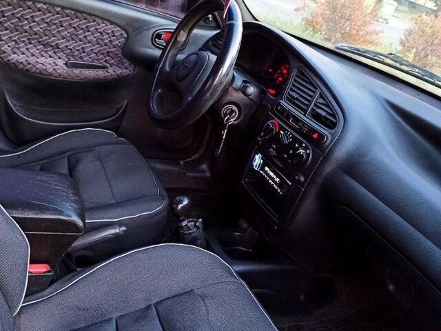 Бежевый Дэу Ланос, объемом двигателя 1.3 л и пробегом 210 тыс. км за 1950 $, фото 5 на Automoto.ua