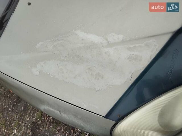 Бежевий Деу Ланос, об'ємом двигуна 1.5 л та пробігом 348 тис. км за 1450 $, фото 17 на Automoto.ua