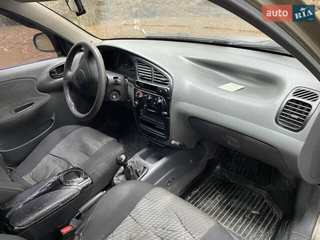 Бежевий Деу Ланос, об'ємом двигуна 1.5 л та пробігом 183 тис. км за 2000 $, фото 8 на Automoto.ua