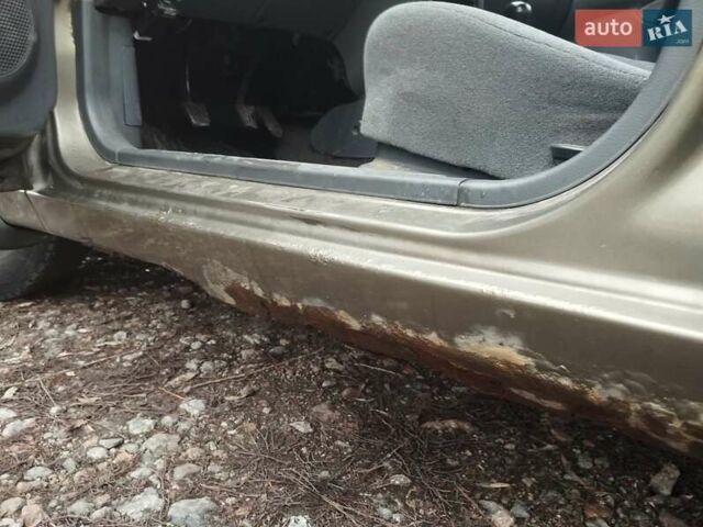 Бежевий Деу Ланос, об'ємом двигуна 1.5 л та пробігом 348 тис. км за 1450 $, фото 27 на Automoto.ua