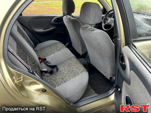 Бежевий Деу Ланос, об'ємом двигуна 1.3 л та пробігом 136 тис. км за 2650 $, фото 5 на Automoto.ua