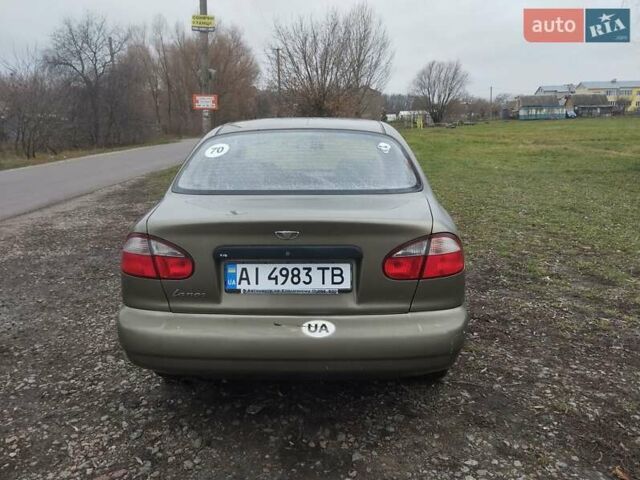 Бежевий Деу Ланос, об'ємом двигуна 1.5 л та пробігом 348 тис. км за 1450 $, фото 4 на Automoto.ua