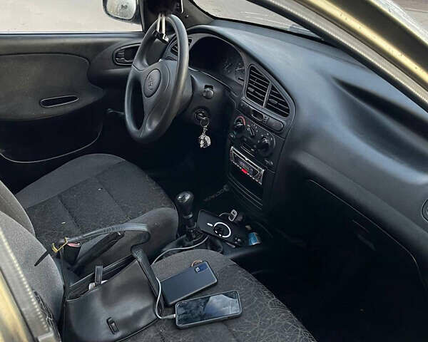 Бежевый Дэу Ланос, объемом двигателя 1.3 л и пробегом 150 тыс. км за 900 $, фото 6 на Automoto.ua