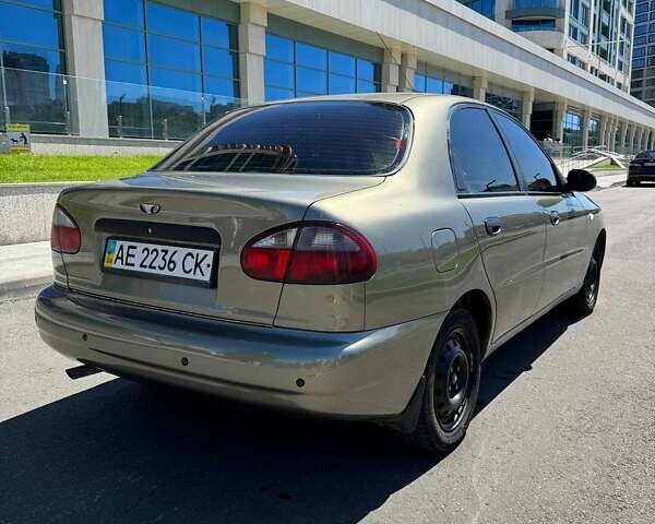 Бежевый Дэу Ланос, объемом двигателя 1.5 л и пробегом 305 тыс. км за 3200 $, фото 2 на Automoto.ua