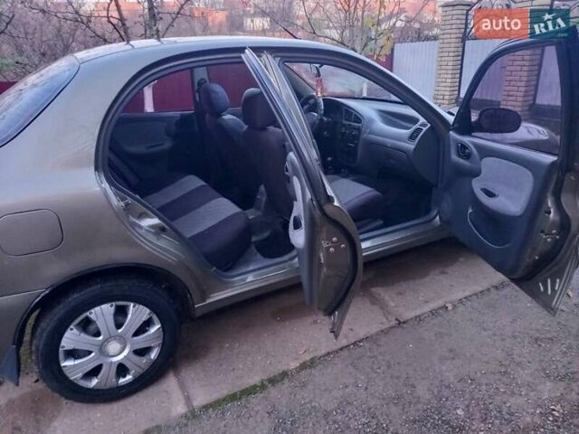 Бежевий Деу Ланос, об'ємом двигуна 1.6 л та пробігом 223 тис. км за 2650 $, фото 4 на Automoto.ua