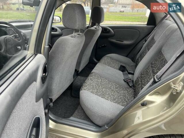 Бежевий Деу Ланос, об'ємом двигуна 1.35 л та пробігом 136 тис. км за 2650 $, фото 11 на Automoto.ua