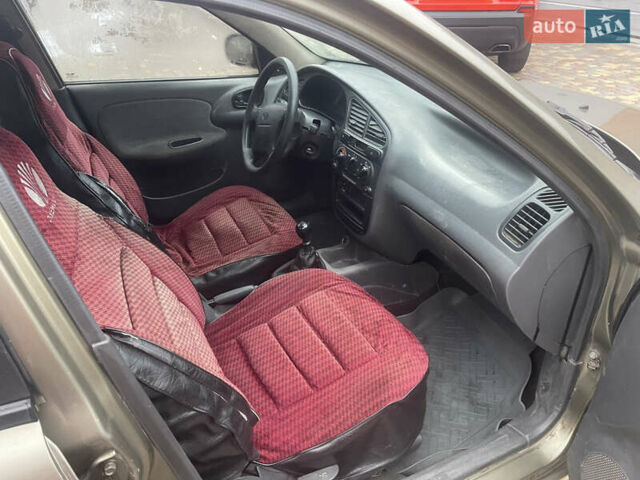 Бежевый Дэу Ланос, объемом двигателя 1.5 л и пробегом 777 тыс. км за 900 $, фото 11 на Automoto.ua