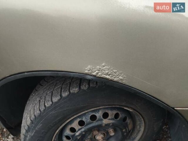 Бежевий Деу Ланос, об'ємом двигуна 1.5 л та пробігом 348 тис. км за 1450 $, фото 19 на Automoto.ua