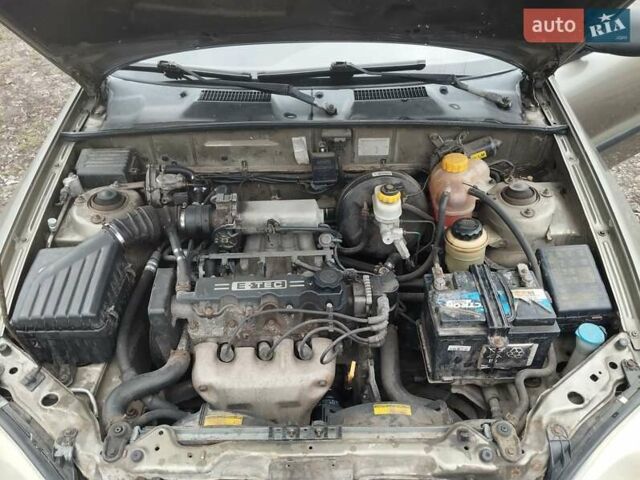 Бежевий Деу Ланос, об'ємом двигуна 1.5 л та пробігом 348 тис. км за 1450 $, фото 14 на Automoto.ua