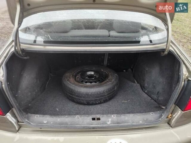 Бежевий Деу Ланос, об'ємом двигуна 1.5 л та пробігом 348 тис. км за 1450 $, фото 9 на Automoto.ua