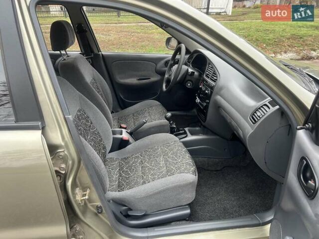 Бежевий Деу Ланос, об'ємом двигуна 1.35 л та пробігом 136 тис. км за 2650 $, фото 13 на Automoto.ua