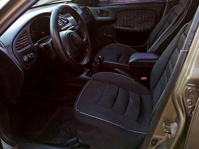 Бежевый Дэу Ланос, объемом двигателя 1.3 л и пробегом 210 тыс. км за 1950 $, фото 3 на Automoto.ua