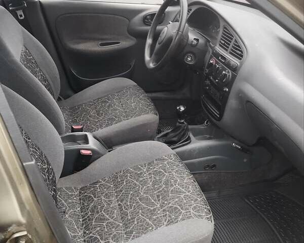 Бежевий Деу Ланос, об'ємом двигуна 1.5 л та пробігом 348 тис. км за 1450 $, фото 10 на Automoto.ua