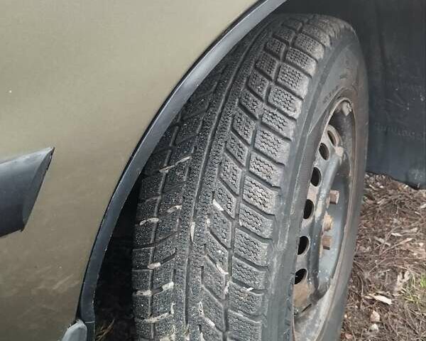 Бежевий Деу Ланос, об'ємом двигуна 1.5 л та пробігом 348 тис. км за 1450 $, фото 13 на Automoto.ua