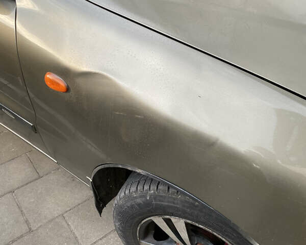 Бежевый Дэу Ланос, объемом двигателя 1.5 л и пробегом 250 тыс. км за 2300 $, фото 10 на Automoto.ua