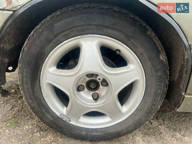 Бежевый Дэу Ланос, объемом двигателя 1.5 л и пробегом 265 тыс. км за 1999 $, фото 4 на Automoto.ua