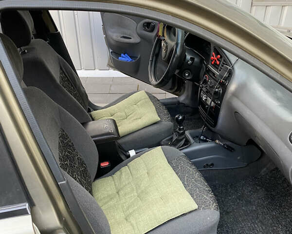 Бежевый Дэу Ланос, объемом двигателя 1.5 л и пробегом 250 тыс. км за 2300 $, фото 3 на Automoto.ua