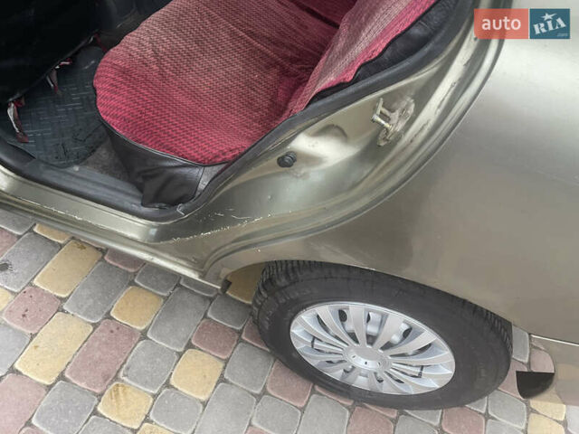 Бежевый Дэу Ланос, объемом двигателя 1.5 л и пробегом 777 тыс. км за 900 $, фото 13 на Automoto.ua