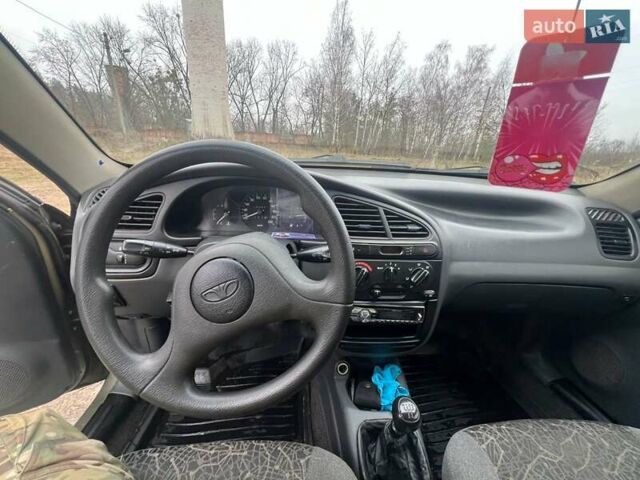 Бежевый Дэу Ланос, объемом двигателя 1.5 л и пробегом 265 тыс. км за 1999 $, фото 7 на Automoto.ua