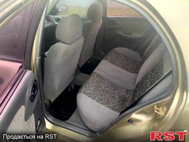 Бежевий Деу Ланос, об'ємом двигуна 1.5 л та пробігом 195 тис. км за 1999 $, фото 11 на Automoto.ua