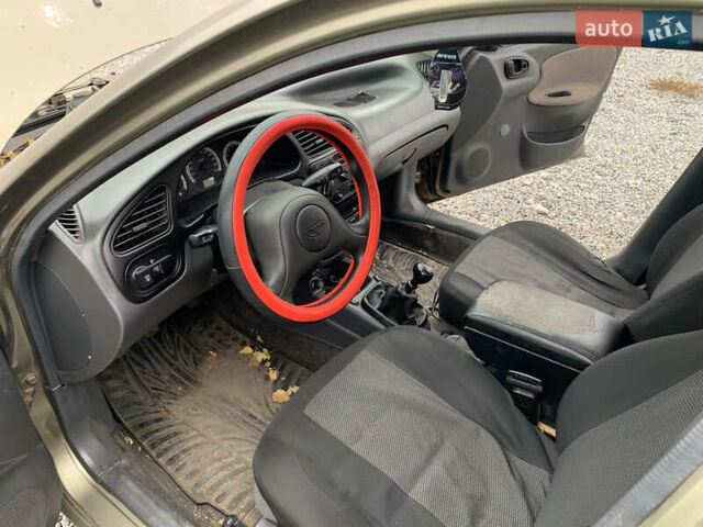 Бежевый Дэу Ланос, объемом двигателя 1.5 л и пробегом 155 тыс. км за 2100 $, фото 1 на Automoto.ua