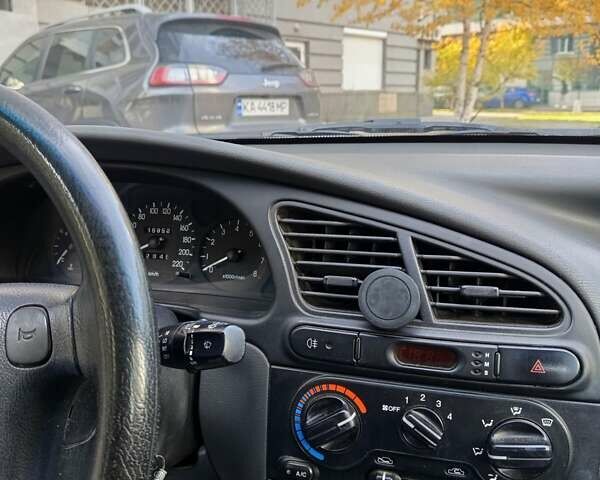 Бежевый Дэу Ланос, объемом двигателя 1.5 л и пробегом 159 тыс. км за 2350 $, фото 4 на Automoto.ua